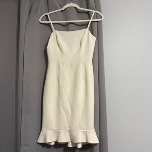 Short White Frill Hem Dress.